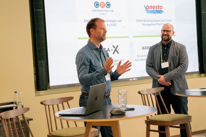 Maximilian Count von Brühl of MICE Portal and Freek Zindel of aanmelder during the value chain mapping session at the MICE Executive Circle 2026 (MEC 2026) at Lake Starnberg. Interacting on stage, they demonstrate how partners collaborate across the booking and payment journey. The value chain mapping showcases an end-to-end process in digital event sourcing, from booking through to invoicing, at the MICE Portal industry event.
