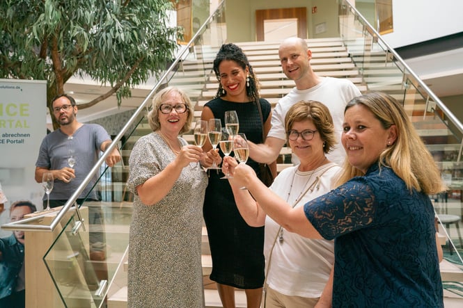 Vinzenz Count von Brühl and Josephine Countess von Brühl of MICE Portal join Pauline Viel, Charlotte Le Maoût, and Annette Botticchio of Châteauform’ in a toast on the staircase in the foyer, celebrating the launch of OneMICE. Smiling and raising their glasses, the group marks the start of the partnership at the MICE Executive Circle 2026 (MEC 2026) at Lake Starnberg. OneMICE brings together booking, invoicing, attendee management, and AI in a seamless end-to-end process for digital event sourcing.